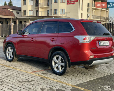 Красный Мицубиси Аутлендер, объемом двигателя 3 л и пробегом 230 тыс. км за 13900 $, фото 16 на Automoto.ua