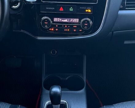 Красный Мицубиси Аутлендер, объемом двигателя 2.4 л и пробегом 209 тыс. км за 12990 $, фото 7 на Automoto.ua