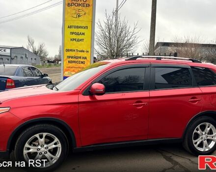Красный Мицубиси Аутлендер, объемом двигателя 2.4 л и пробегом 209 тыс. км за 13500 $, фото 4 на Automoto.ua