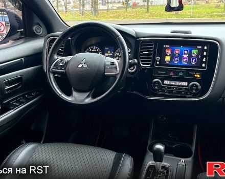 Красный Мицубиси Аутлендер, объемом двигателя 2.4 л и пробегом 209 тыс. км за 13500 $, фото 12 на Automoto.ua