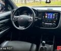 Красный Мицубиси Аутлендер, объемом двигателя 2.4 л и пробегом 209 тыс. км за 13500 $, фото 12 на Automoto.ua