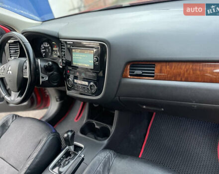 Красный Мицубиси Аутлендер, объемом двигателя 3 л и пробегом 230 тыс. км за 13900 $, фото 27 на Automoto.ua