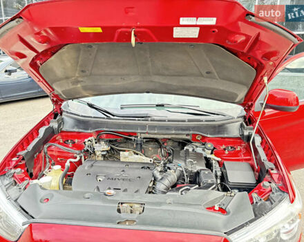 Красный Мицубиси Аутлендер, объемом двигателя 2 л и пробегом 210 тыс. км за 13500 $, фото 19 на Automoto.ua