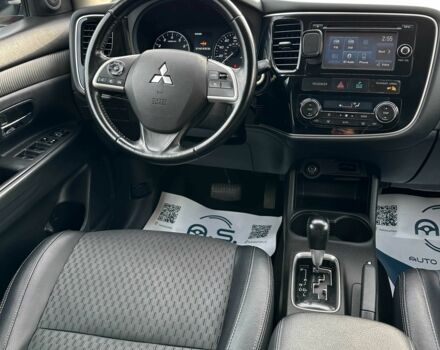 Красный Мицубиси Аутлендер, объемом двигателя 2.4 л и пробегом 213 тыс. км за 11900 $, фото 6 на Automoto.ua