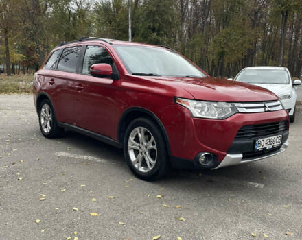 Червоний Міцубісі Аутлендер, об'ємом двигуна 2.36 л та пробігом 149 тис. км за 12500 $, фото 3 на Automoto.ua