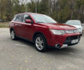 Червоний Міцубісі Аутлендер, об'ємом двигуна 2.36 л та пробігом 149 тис. км за 12500 $, фото 3 на Automoto.ua