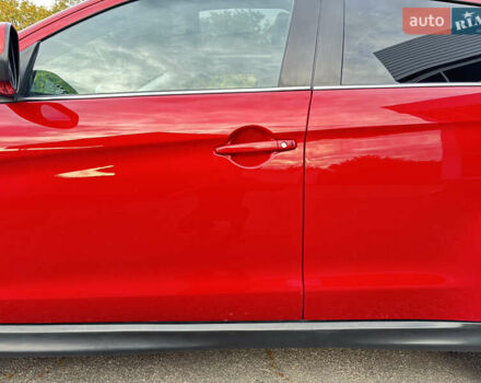 Красный Мицубиси Аутлендер, объемом двигателя 2 л и пробегом 210 тыс. км за 13500 $, фото 5 на Automoto.ua