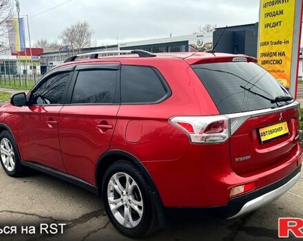 Красный Мицубиси Аутлендер, объемом двигателя 2.4 л и пробегом 209 тыс. км за 13500 $, фото 5 на Automoto.ua