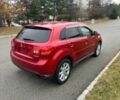 Червоний Міцубісі Аутлендер, об'ємом двигуна 2 л та пробігом 75 тис. км за 9000 $, фото 4 на Automoto.ua