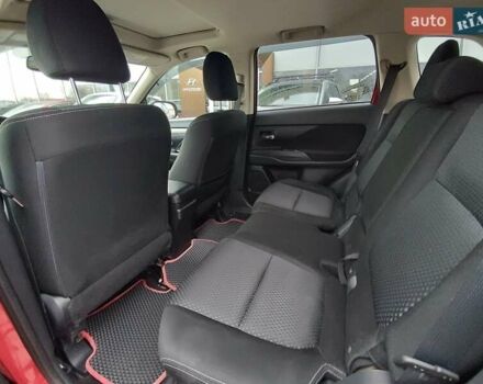 Красный Мицубиси Аутлендер, объемом двигателя 2.36 л и пробегом 172 тыс. км за 12300 $, фото 11 на Automoto.ua