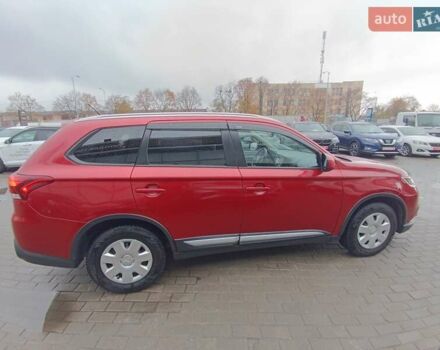 Красный Мицубиси Аутлендер, объемом двигателя 2.36 л и пробегом 172 тыс. км за 12300 $, фото 8 на Automoto.ua
