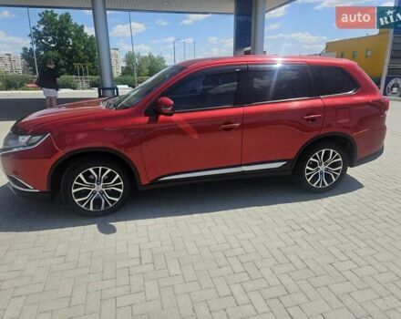 Червоний Міцубісі Аутлендер, об'ємом двигуна 2.4 л та пробігом 182 тис. км за 14900 $, фото 1 на Automoto.ua
