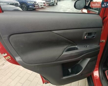 Красный Мицубиси Аутлендер, объемом двигателя 2.36 л и пробегом 172 тыс. км за 12300 $, фото 12 на Automoto.ua