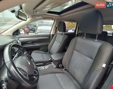 Красный Мицубиси Аутлендер, объемом двигателя 2.36 л и пробегом 172 тыс. км за 12300 $, фото 24 на Automoto.ua