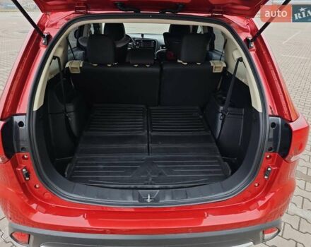 Красный Мицубиси Аутлендер, объемом двигателя 2.36 л и пробегом 123 тыс. км за 15300 $, фото 14 на Automoto.ua