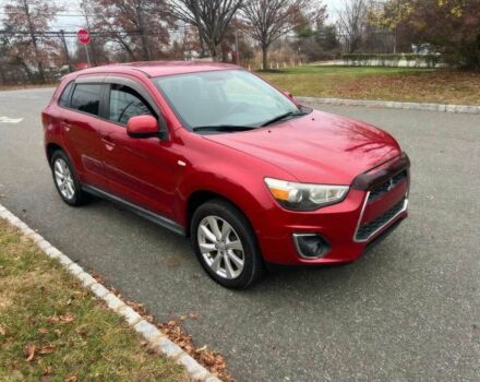 Червоний Міцубісі Аутлендер, об'ємом двигуна 2 л та пробігом 75 тис. км за 9000 $, фото 2 на Automoto.ua