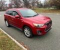 Червоний Міцубісі Аутлендер, об'ємом двигуна 2 л та пробігом 75 тис. км за 9000 $, фото 2 на Automoto.ua