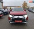 Красный Мицубиси Аутлендер, объемом двигателя 2.36 л и пробегом 172 тыс. км за 12300 $, фото 1 на Automoto.ua
