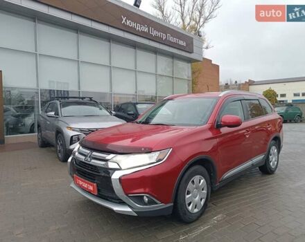 Красный Мицубиси Аутлендер, объемом двигателя 2.36 л и пробегом 172 тыс. км за 12300 $, фото 2 на Automoto.ua