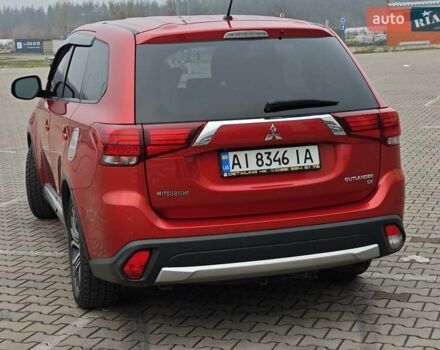 Красный Мицубиси Аутлендер, объемом двигателя 2.36 л и пробегом 123 тыс. км за 15300 $, фото 3 на Automoto.ua
