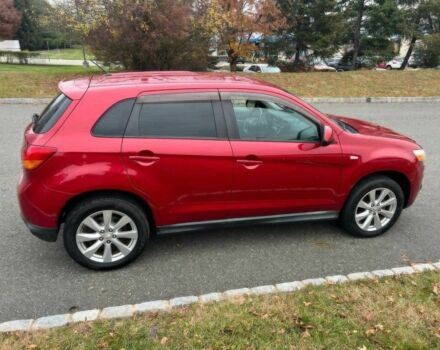 Червоний Міцубісі Аутлендер, об'ємом двигуна 2 л та пробігом 75 тис. км за 9000 $, фото 3 на Automoto.ua