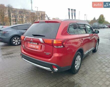Красный Мицубиси Аутлендер, объемом двигателя 2.36 л и пробегом 172 тыс. км за 12300 $, фото 6 на Automoto.ua