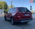 Червоний Міцубісі Аутлендер, об'ємом двигуна 2.27 л та пробігом 150 тис. км за 17600 $, фото 4 на Automoto.ua