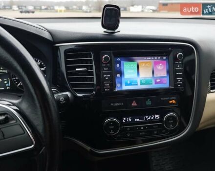 Красный Мицубиси Аутлендер, объемом двигателя 2.36 л и пробегом 123 тыс. км за 15300 $, фото 10 на Automoto.ua