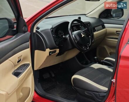 Красный Мицубиси Аутлендер, объемом двигателя 2.36 л и пробегом 123 тыс. км за 15300 $, фото 7 на Automoto.ua