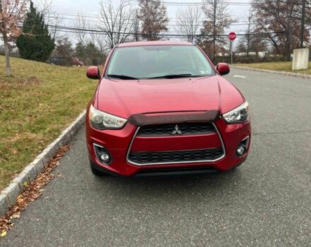 Червоний Міцубісі Аутлендер, об'ємом двигуна 2 л та пробігом 75 тис. км за 9000 $, фото 1 на Automoto.ua