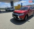 Червоний Міцубісі Аутлендер, об'ємом двигуна 2.4 л та пробігом 182 тис. км за 14900 $, фото 1 на Automoto.ua