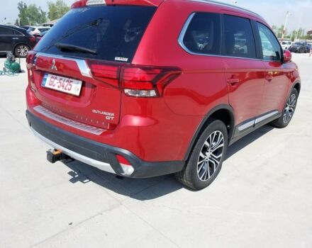 Червоний Міцубісі Аутлендер, об'ємом двигуна 3 л та пробігом 58 тис. км за 19000 $, фото 2 на Automoto.ua