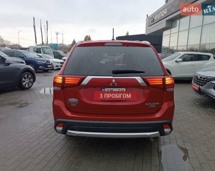 Красный Мицубиси Аутлендер, объемом двигателя 2.36 л и пробегом 172 тыс. км за 12300 $, фото 5 на Automoto.ua