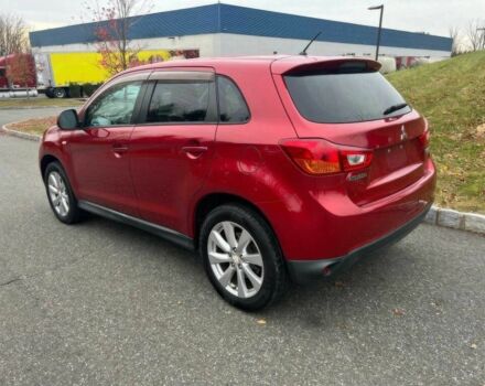 Червоний Міцубісі Аутлендер, об'ємом двигуна 2 л та пробігом 75 тис. км за 9000 $, фото 5 на Automoto.ua