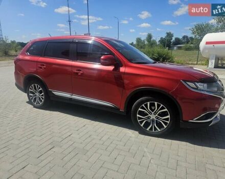 Червоний Міцубісі Аутлендер, об'ємом двигуна 2.4 л та пробігом 182 тис. км за 14900 $, фото 2 на Automoto.ua