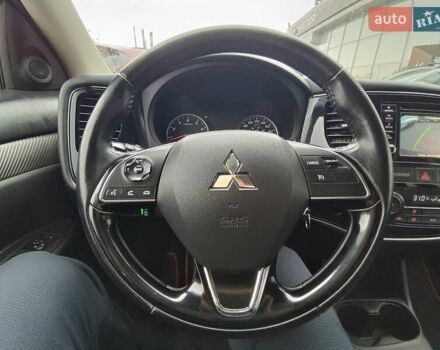 Красный Мицубиси Аутлендер, объемом двигателя 2.36 л и пробегом 172 тыс. км за 12300 $, фото 16 на Automoto.ua
