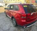 Красный Мицубиси Аутлендер, объемом двигателя 2.36 л и пробегом 180 тыс. км за 5000 $, фото 1 на Automoto.ua