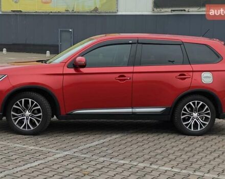 Красный Мицубиси Аутлендер, объемом двигателя 2.36 л и пробегом 123 тыс. км за 15300 $, фото 1 на Automoto.ua