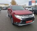Красный Мицубиси Аутлендер, объемом двигателя 2.36 л и пробегом 172 тыс. км за 12300 $, фото 1 на Automoto.ua
