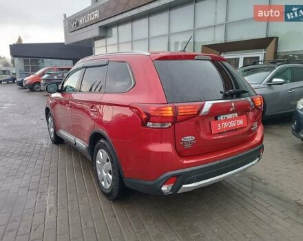 Красный Мицубиси Аутлендер, объемом двигателя 2.36 л и пробегом 172 тыс. км за 12300 $, фото 4 на Automoto.ua