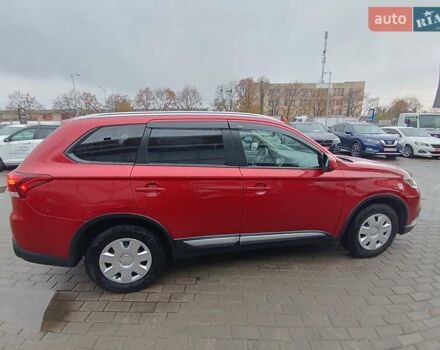 Красный Мицубиси Аутлендер, объемом двигателя 2.36 л и пробегом 172 тыс. км за 12300 $, фото 7 на Automoto.ua