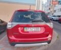 Красный Мицубиси Аутлендер, объемом двигателя 2.38 л и пробегом 206 тыс. км за 13500 $, фото 5 на Automoto.ua