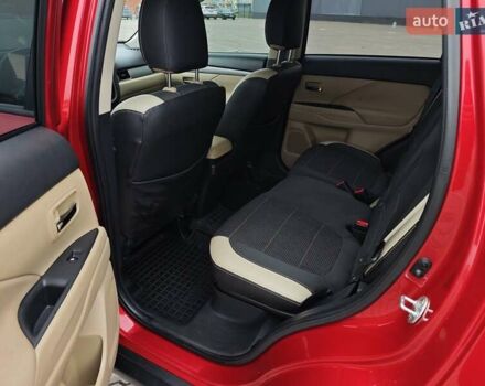 Красный Мицубиси Аутлендер, объемом двигателя 2.36 л и пробегом 123 тыс. км за 15300 $, фото 11 на Automoto.ua