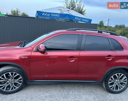 Красный Мицубиси Аутлендер, объемом двигателя 2 л и пробегом 123 тыс. км за 15000 $, фото 4 на Automoto.ua