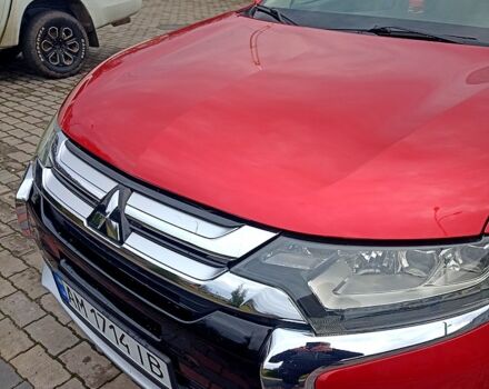 Червоний Міцубісі Аутлендер, об'ємом двигуна 2.4 л та пробігом 131 тис. км за 16300 $, фото 7 на Automoto.ua
