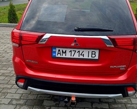 Червоний Міцубісі Аутлендер, об'ємом двигуна 2.4 л та пробігом 131 тис. км за 16300 $, фото 5 на Automoto.ua