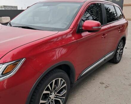 Мицубиси Аутлендер 2016 в Жашкове на Automoto.ua Красный Мицубиси Аутлендер, объемом двигателя 2.36 л и пробегом 270 тыс. км за 12500 $, фото 3 на Automoto.ua