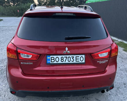Красный Мицубиси Аутлендер, объемом двигателя 2 л и пробегом 123 тыс. км за 15000 $, фото 5 на Automoto.ua