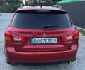 Красный Мицубиси Аутлендер, объемом двигателя 2 л и пробегом 123 тыс. км за 15000 $, фото 5 на Automoto.ua