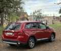 Червоний Міцубісі Аутлендер, об'ємом двигуна 2.36 л та пробігом 190 тис. км за 12000 $, фото 3 на Automoto.ua